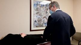 Matthew Squire, MD, MS, with joint replacement patient