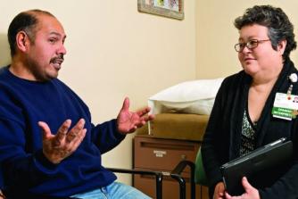 man talking with doctor