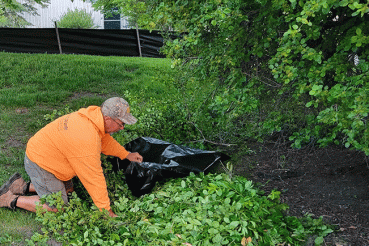 Landscaper Mike Taylor at work following knee replacement surgery