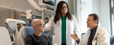 Rush bone marrow transplant specialists with a patient
