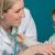 Rush physician interacting with a young boy